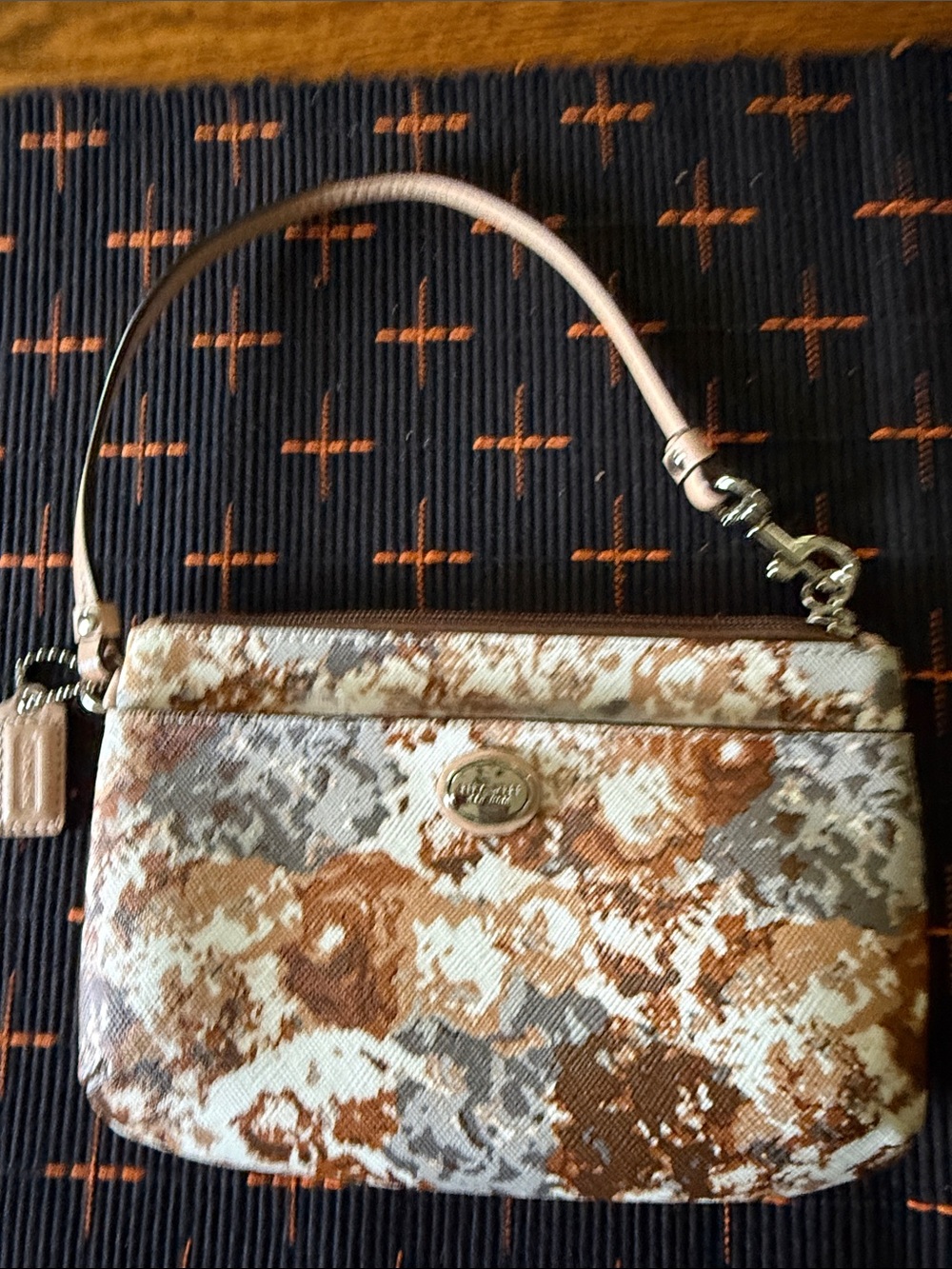 Coach Signature Floral Print Wristlet in Brown and Cream